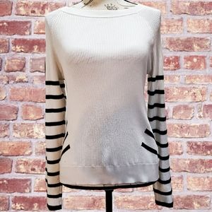 Soft white sweater w/ black stripes